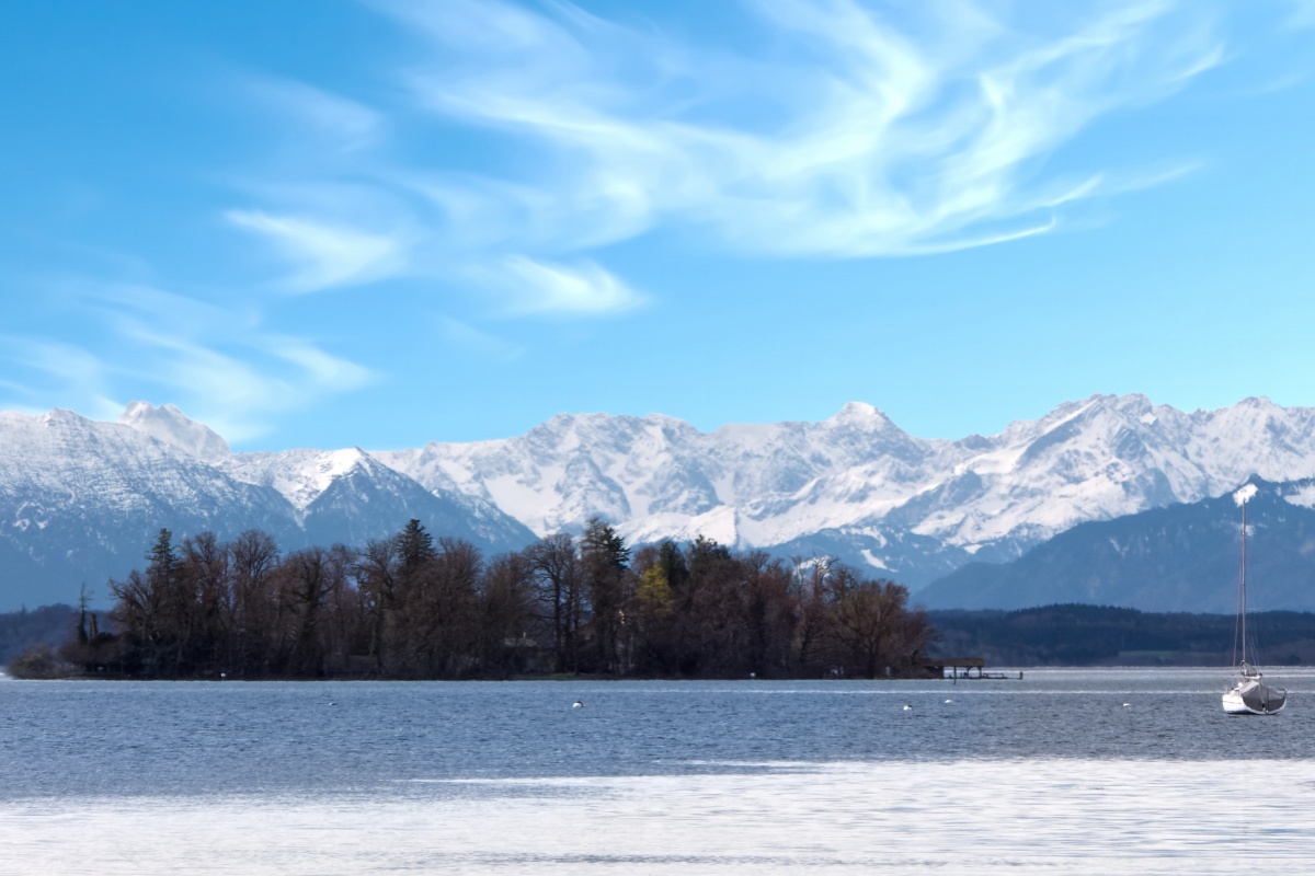 The Roseninsel (Rose Island) is located in Lake Starnberg, south of Munich in Upper Bavaria, in front of the snow-covered mountains